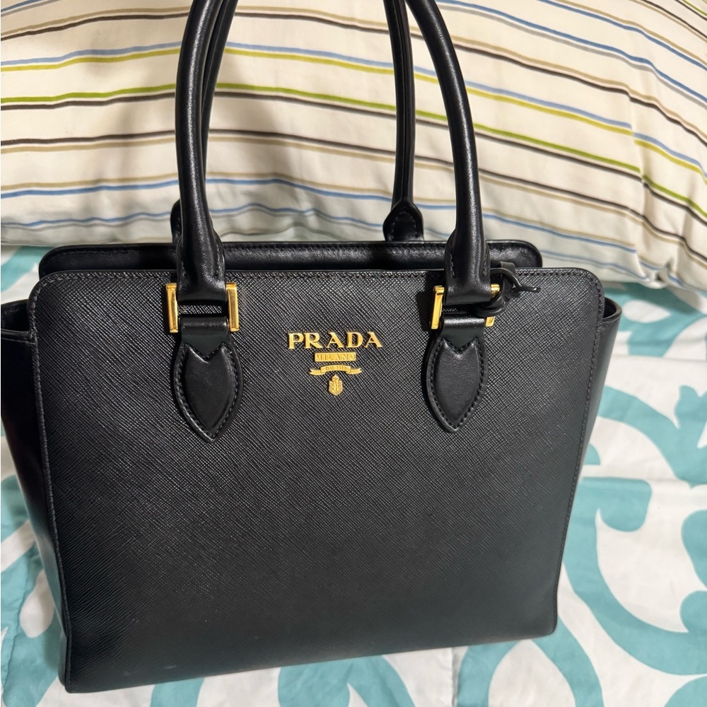 Prada Black Leather Handbag with Gold Accents